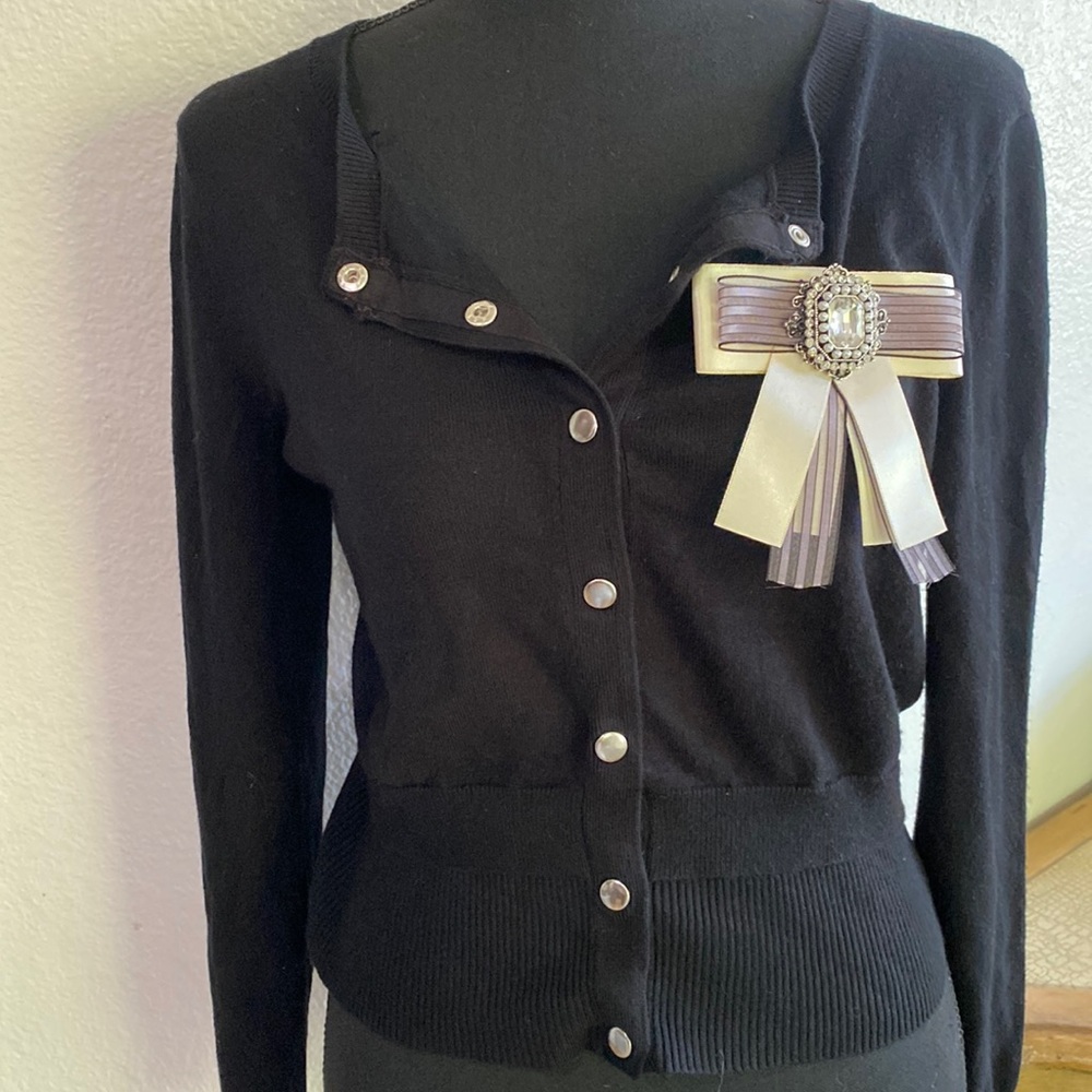 COPY - Cable& gauge, black cardigan with silver button details, broche is remov…